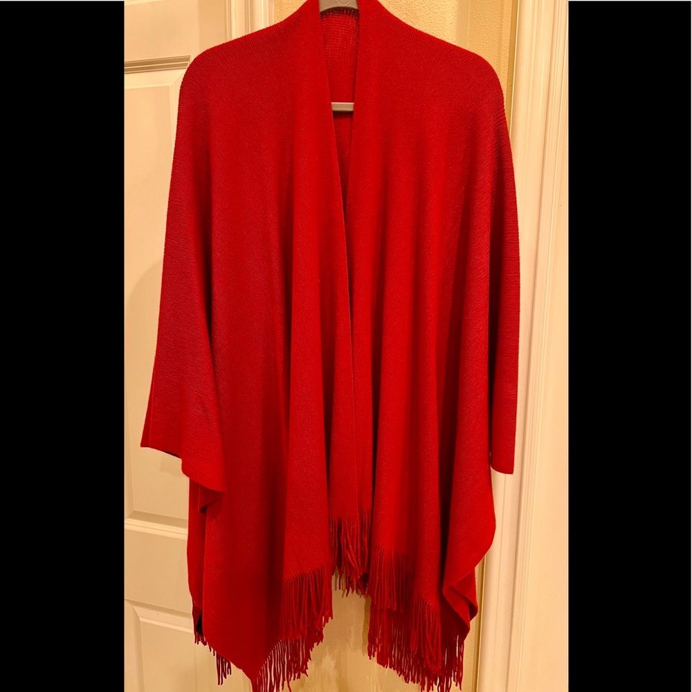 Never worn bright red poncho/wrap with fringe.